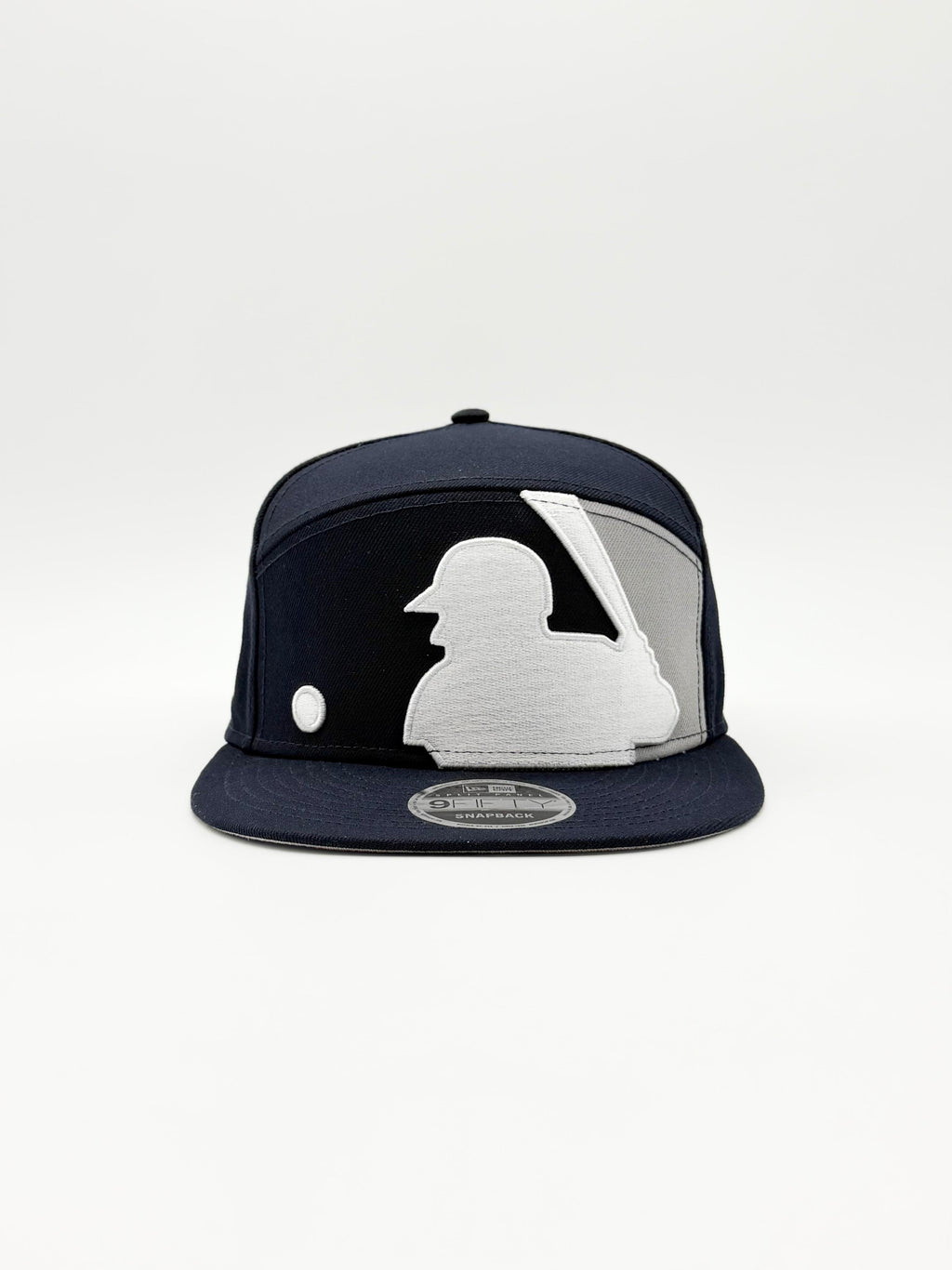 NEW ERA MLB BATTERMAN SPLIT PANEL 9FIFTY SNAPBACK EN COLOR AZUL MARINO CON DETALLES GRISES.