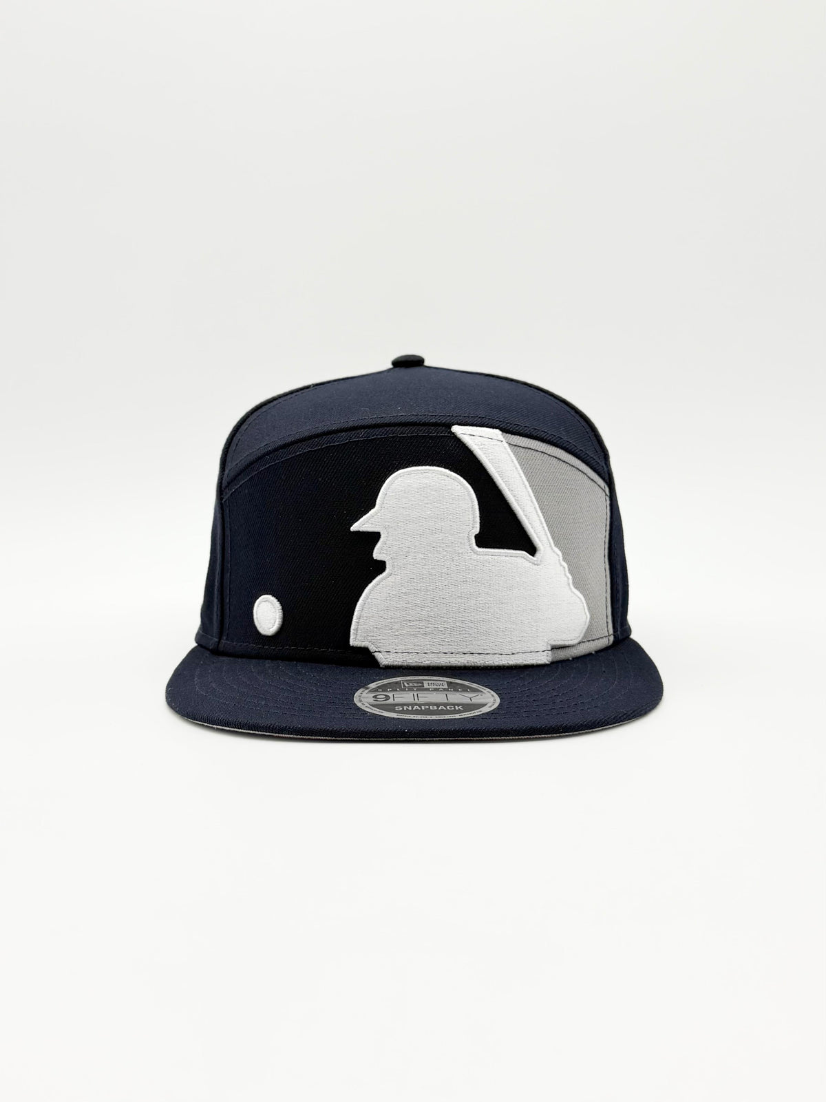 NEW ERA MLB BATTERMAN SPLIT PANEL 9FIFTY SNAPBACK EN COLOR AZUL MARINO CON DETALLES GRISES.